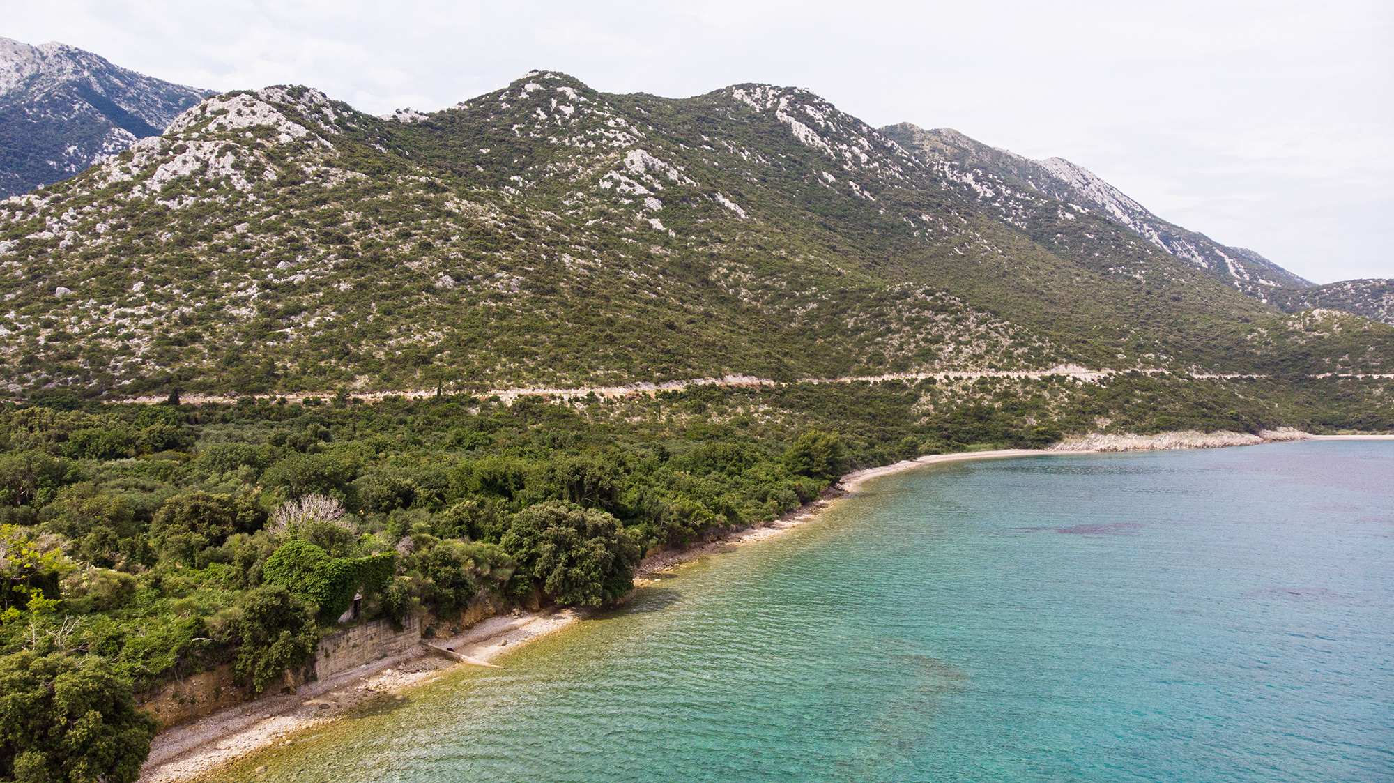 Adriatic Sea and mountains from drone view